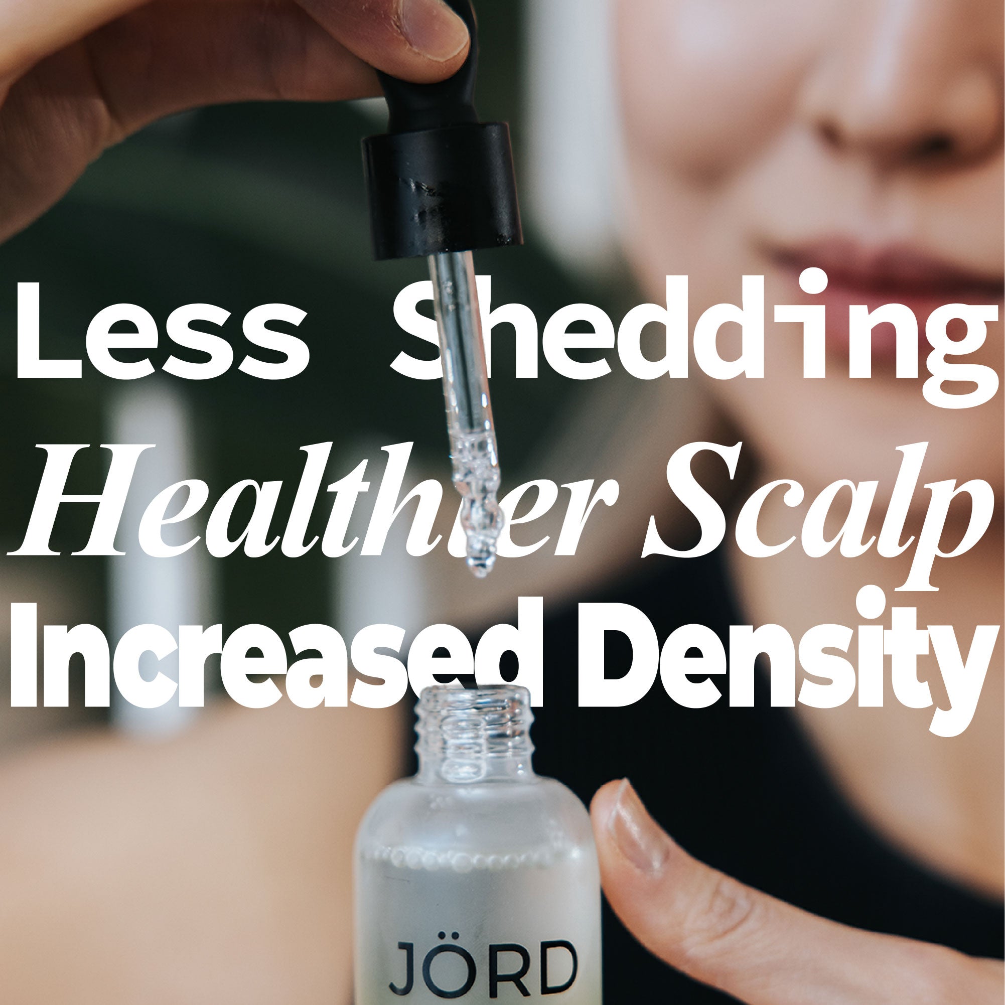 A close-up of a person holding a dropper above an open Jörd bottle, with large overlaid text reading 'Less Shedding, Healthier Scalp, Increased Density.' The product appears to be a scalp-supporting serum or oil, and the visible brand on the bottle is Jörd.
